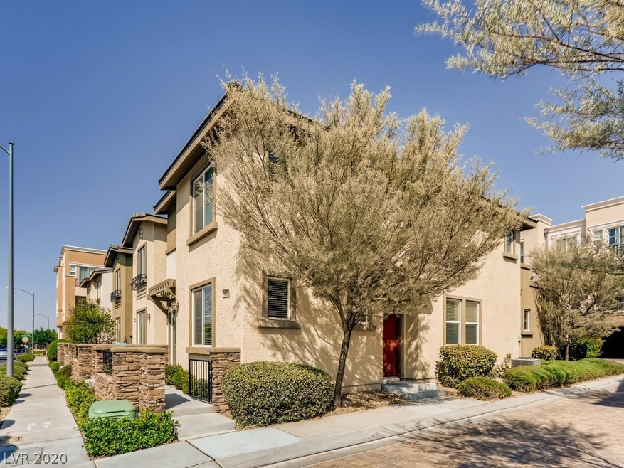 This unique townhouse features a corner lot, cozy