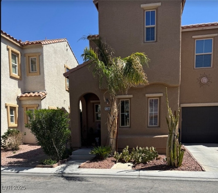 View of front of property featuring stucco siding,