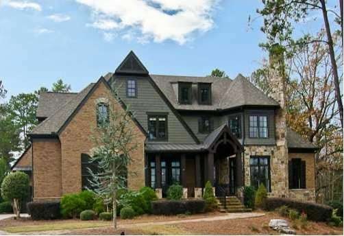 Exterior Front. Beautiful custom estate home in Ri