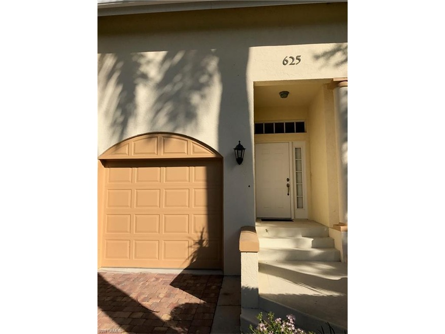 ATTACHED ONE CAR GARAGE WITH DRIVEWAY PAVERS