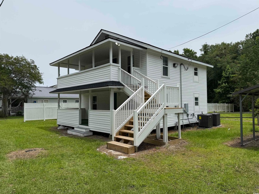 Front view of property featuring central AC unit
