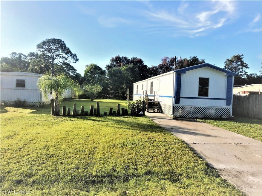 5629 Rainbow Dr, Bokeelia, FL 33922 - photo 1