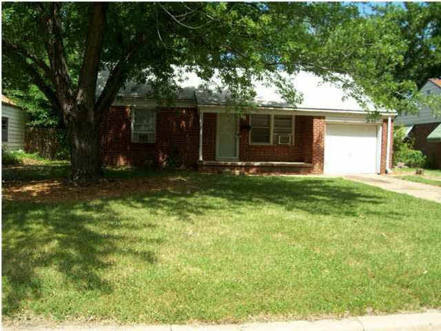 Low maintenance brick home with nice sized lot.