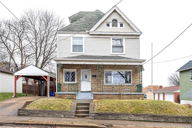 Centralized Coraopolis location with 2 car carport