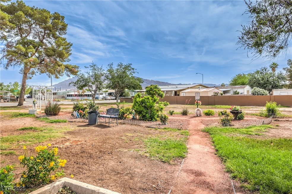 View of yard with a mountain view
