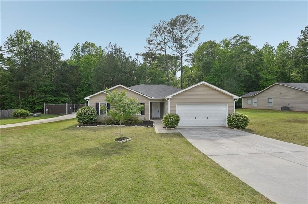 Ranch-style house with central air condition unit,