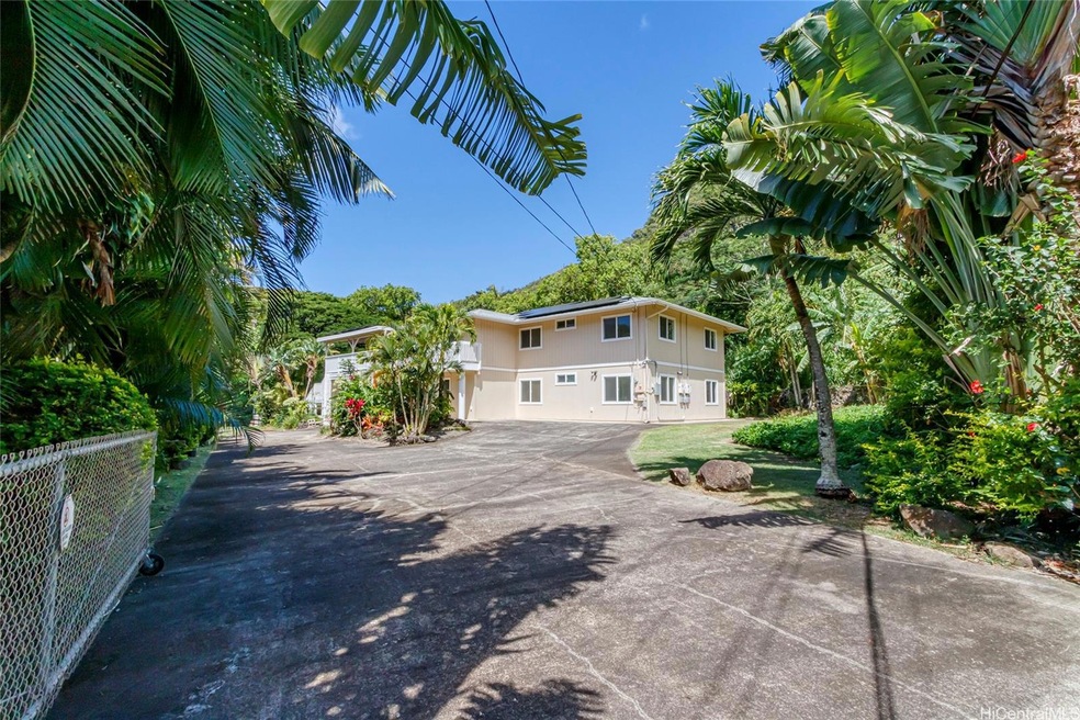 Front of home with gated driveway