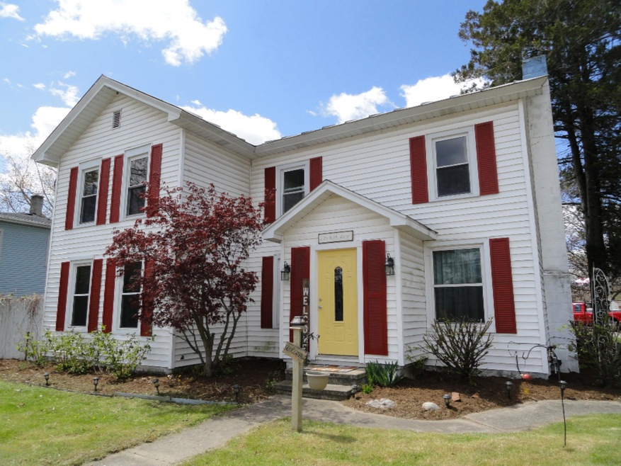 224 N Hudson St SE, Lowell, MI 49331 - photo 1