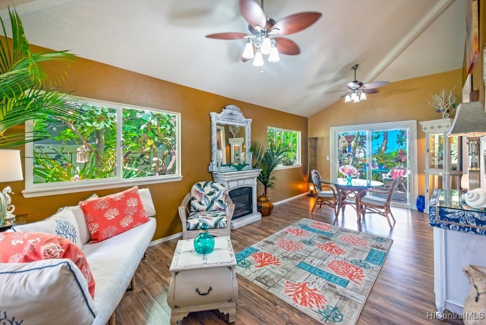 Living area with sliding door leading to lanai and