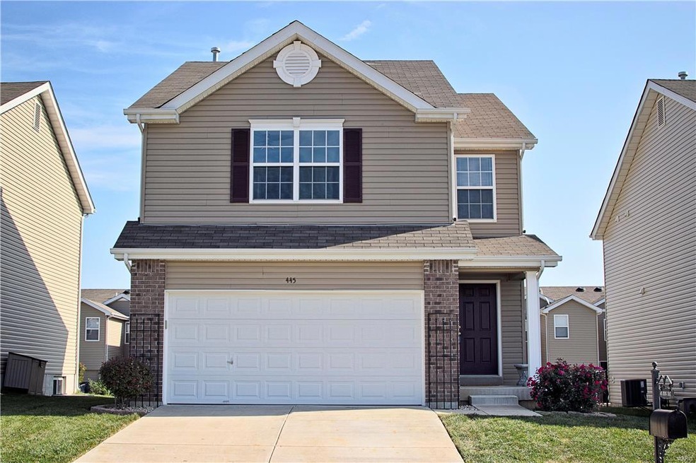 Front elevation with beautiful brick surround and 