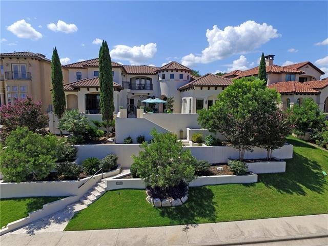 Front Elevation with courtyard entry with pool.
