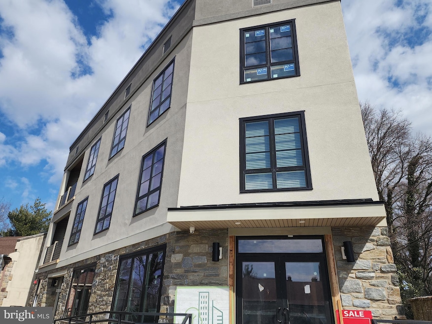 8610 Evergreen Place unit 100, Philadelphia, PA 19118 - photo 1