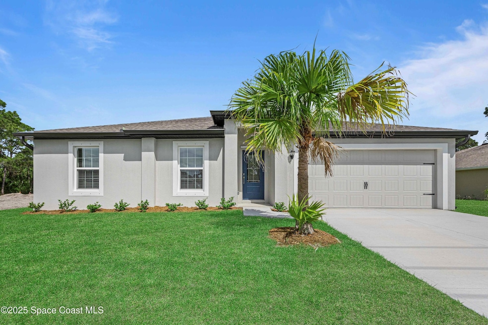 1155 Saturn St SE, Palm Bay, FL 32909 - photo 1