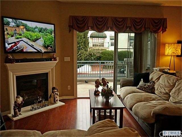 Cozy Living Room with Fireplace and opens to large