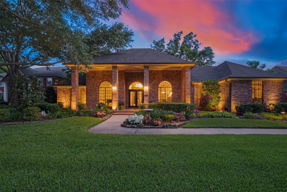 This remarkable custom home is perfectly nestled o
