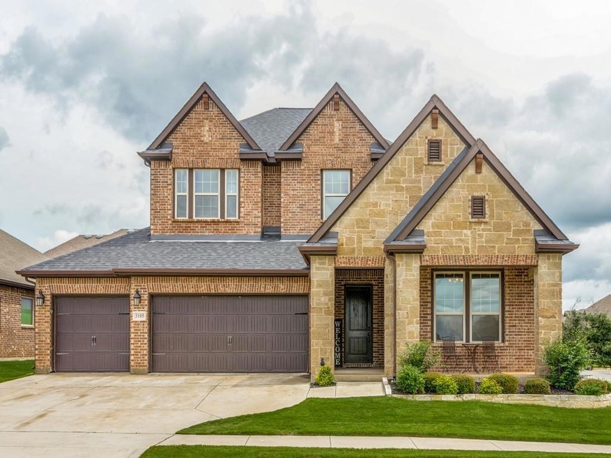 Stunning curb appeal with high pitched roof and st