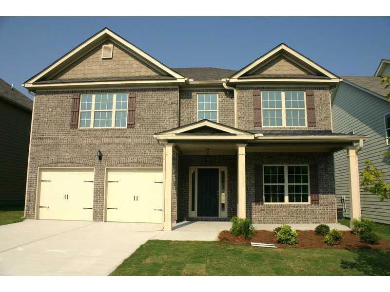 Exterior Front. Brick front home with extended fro