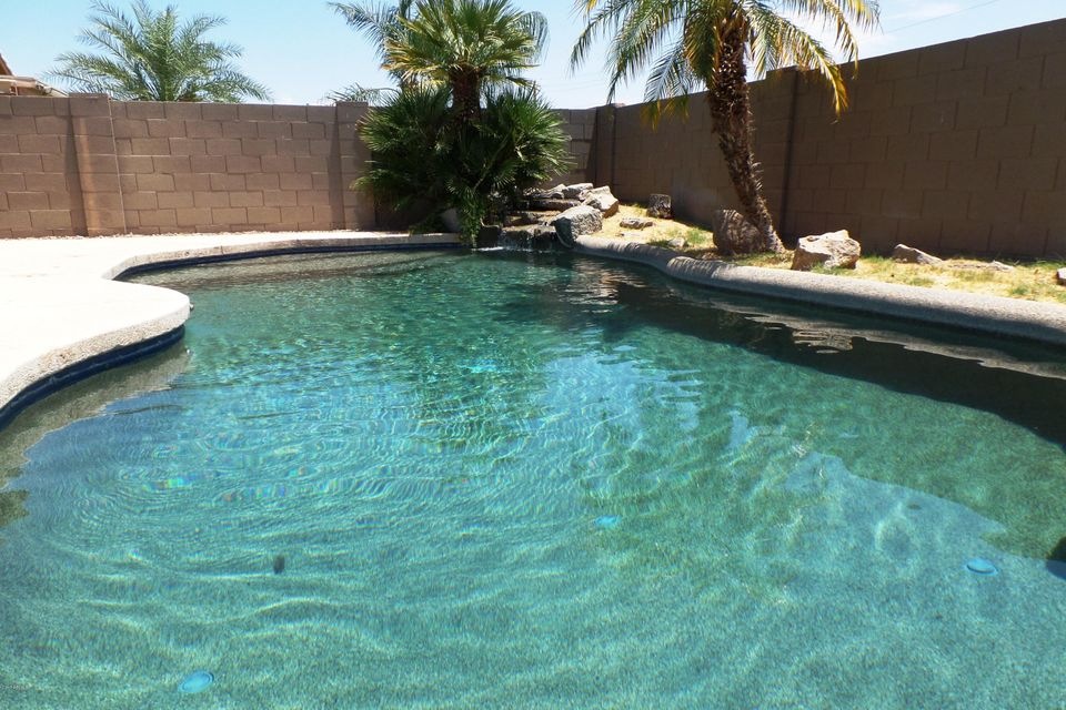 Pebble Tech Pool with Rock Waterfall