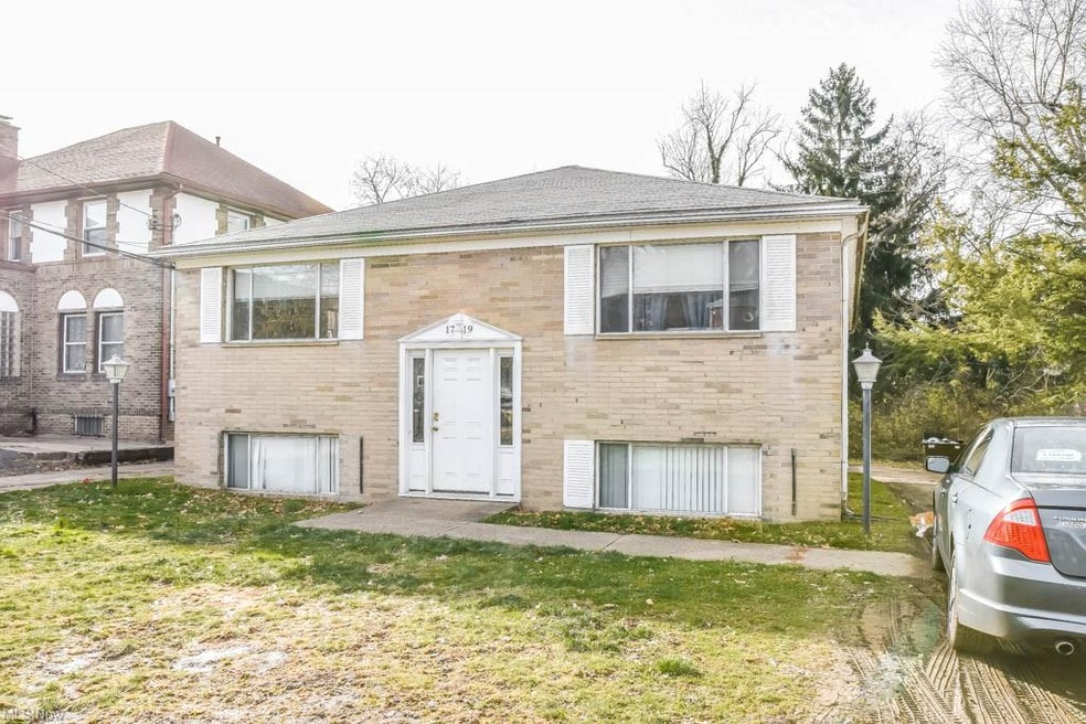 4-unit property with a covered carport.