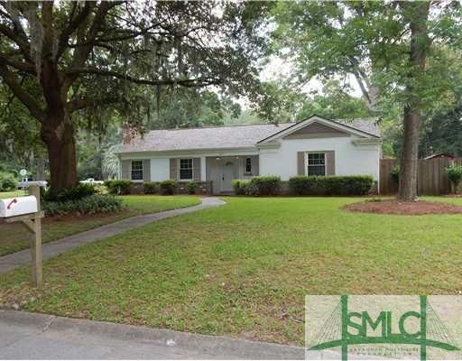 Exterior Front. Beautiful trees on this corner lot