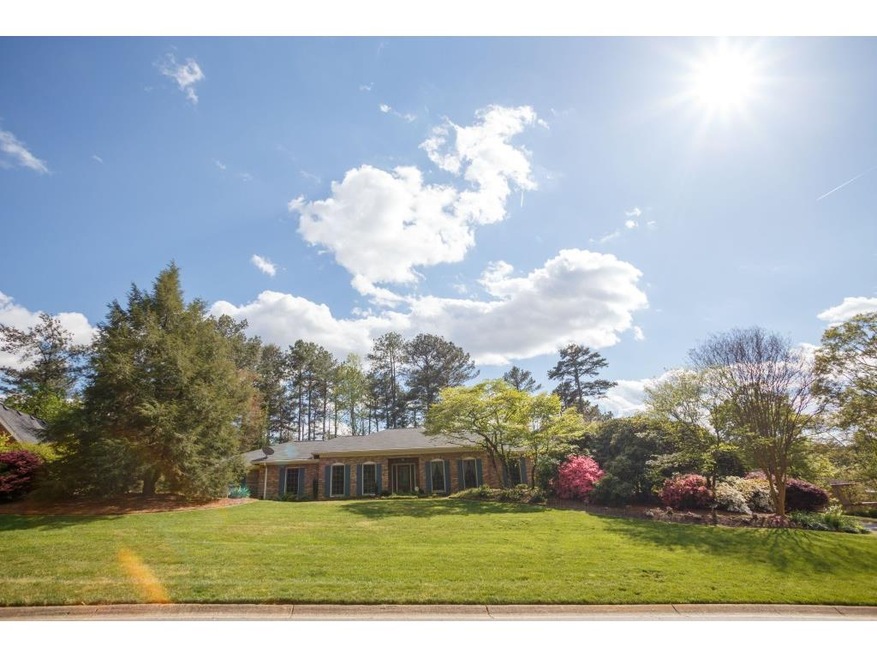 Awesome four sided  brick ranch on a slab, sunroom