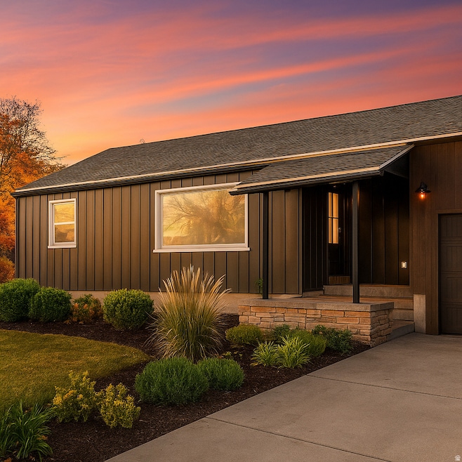 View of front of home with board and batten siding, a shingled roof, a garage, a porch, and concrete driveway Photo enhanced for marketing purposes. Some landscaping and background improvements are conceptual and may not reflect the current property condi
