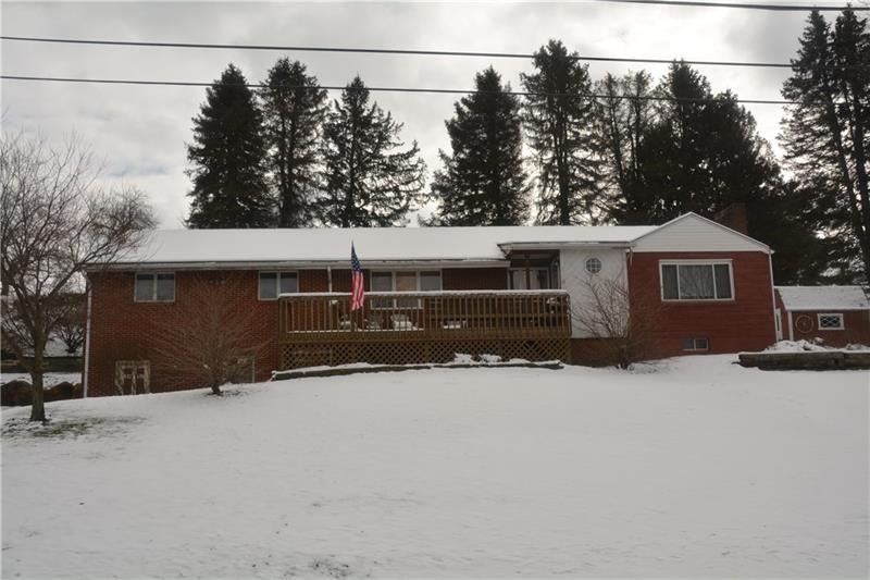 Four bedroom ranch home situated on 1.5 acres