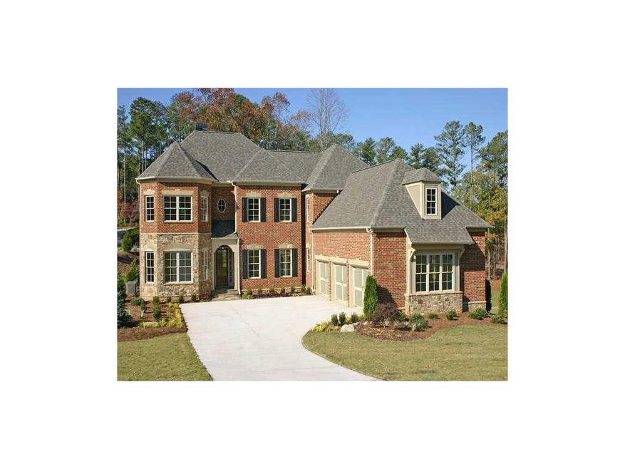 Exterior Front. How Elegant!  3 sided brick/stone 