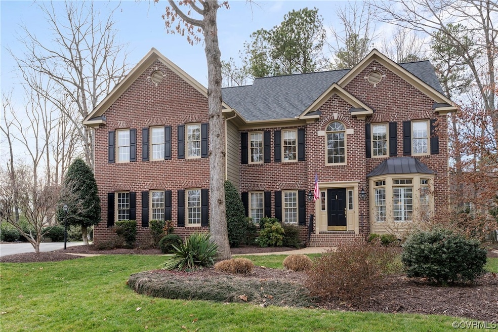 View of front of home featuring a front lawn