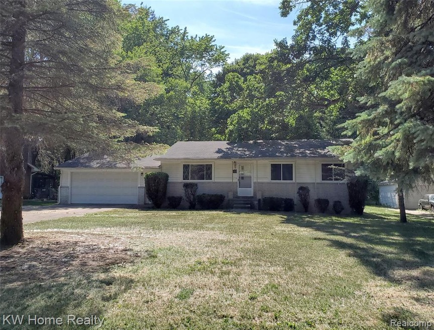 Livonia ranch on .61 acres