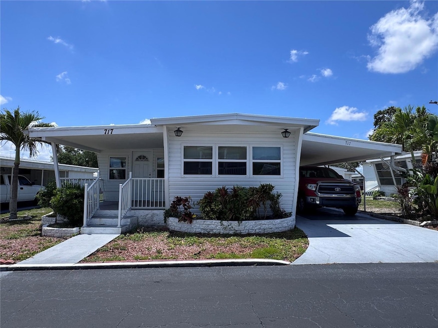 Welcome Home! This home is a well maintained single wide with a Florida Room.