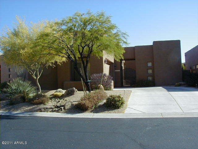 FRONT OF HOME  IN GATED COMMUNITY