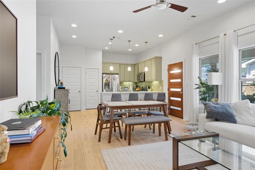 Dining area with light wood-type flooring, recessed lighting, and ceiling fan