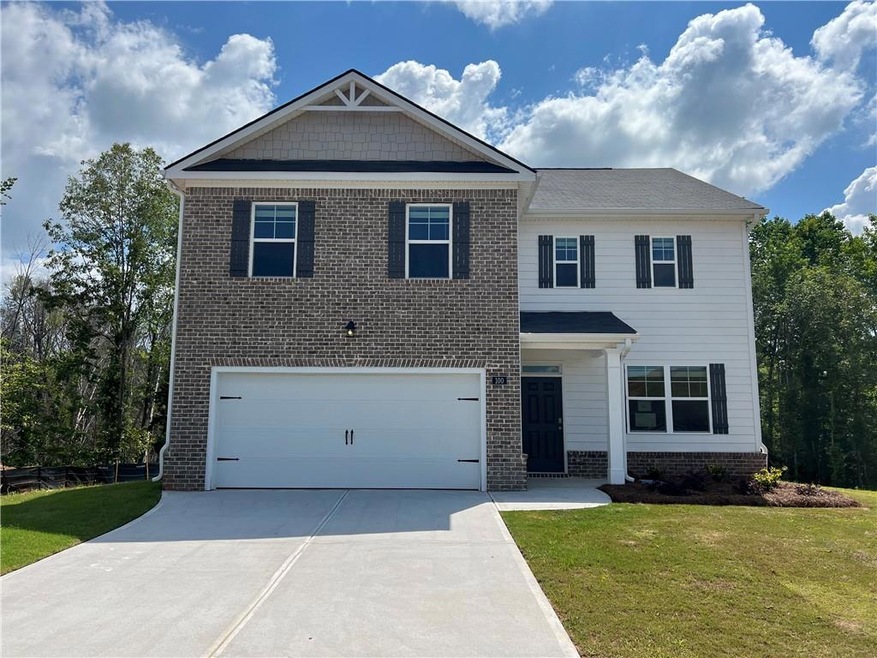 View of front of house featuring a front lawn and 