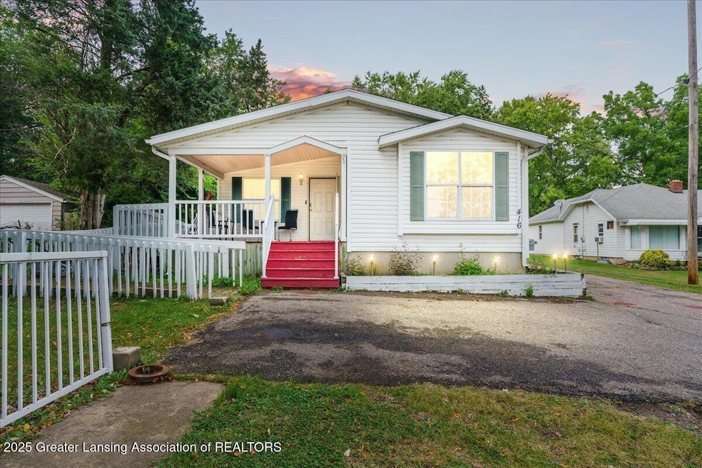416 W Holmes Rd, Lansing, MI 48910 - photo 1