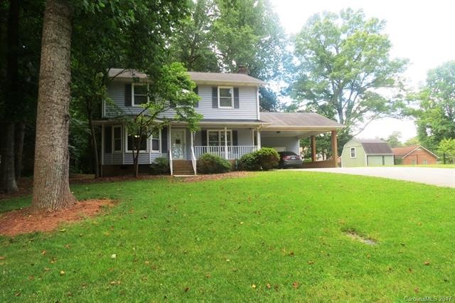 This home sits beautifully on a large lot located 
