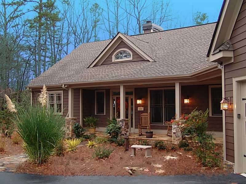 Exterior Front. Beautiful home nestled in lush lan