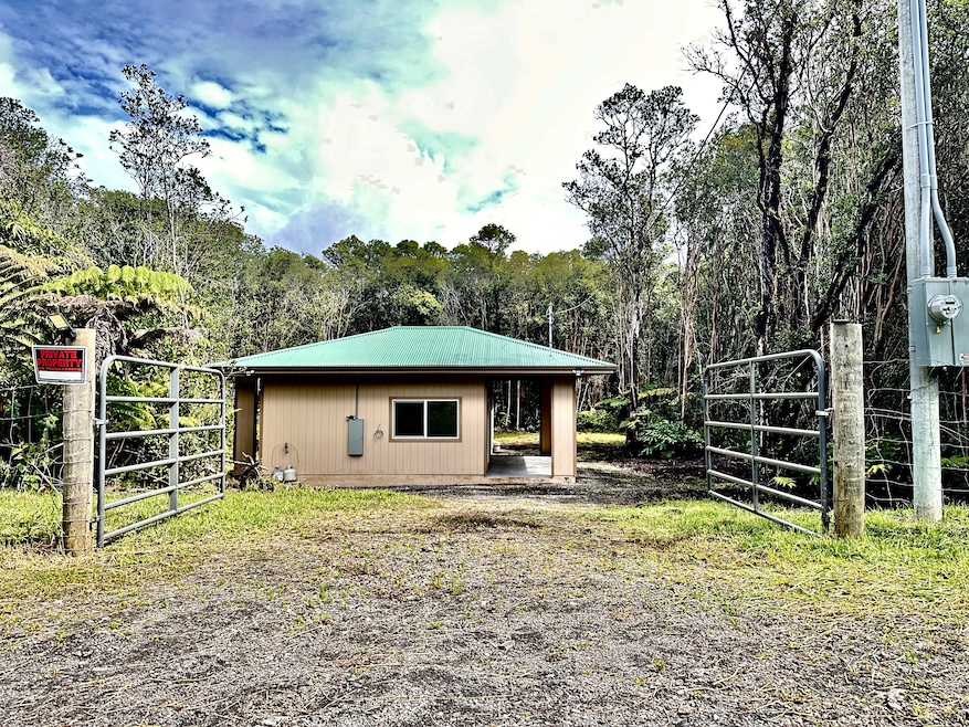 View down the driveway of the home from Elua Road