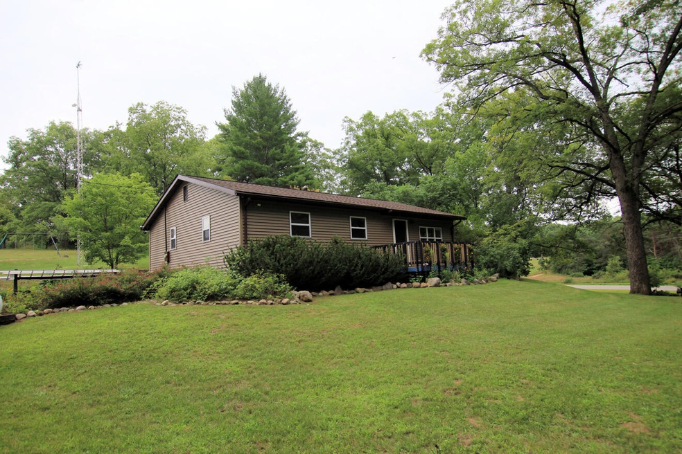 1571 W Woodland Park Dr, Bitely, MI 49309 - photo 1