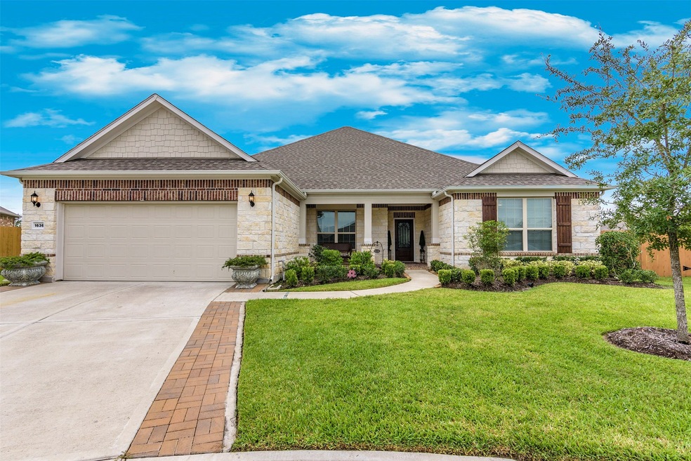 Beautiful stone elevation with extra-wide driveway