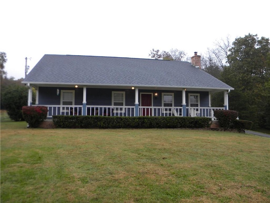 Picture perfect sitting up on the knoll. 1.59 Acre