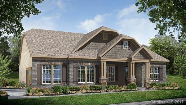 Stunning Amelia Carolina Eclectic exterior with front porch, all you need to bring is the rocking chairs and lemonade!