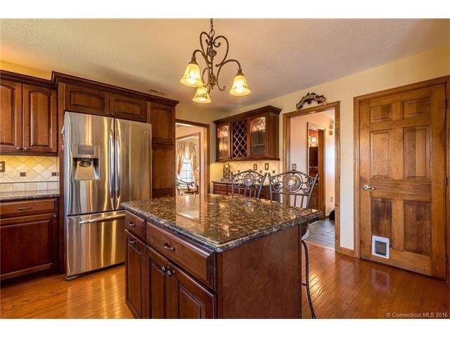 Completely remodeled kitchen features center islan