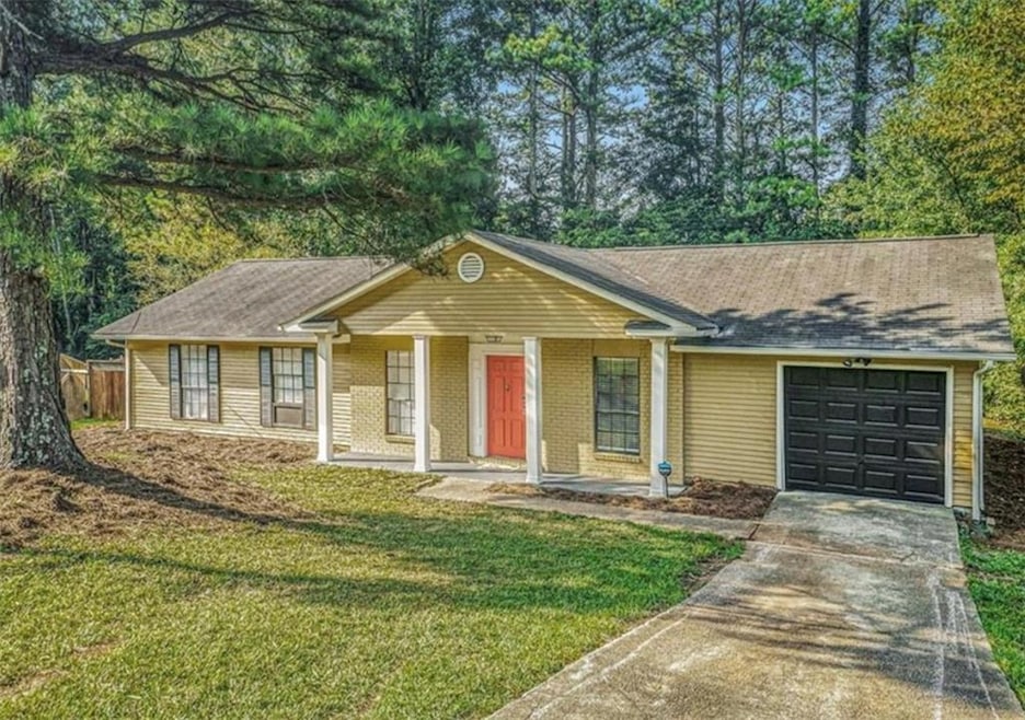 1883 Singer Way, Lithonia, GA 30058 - photo 1