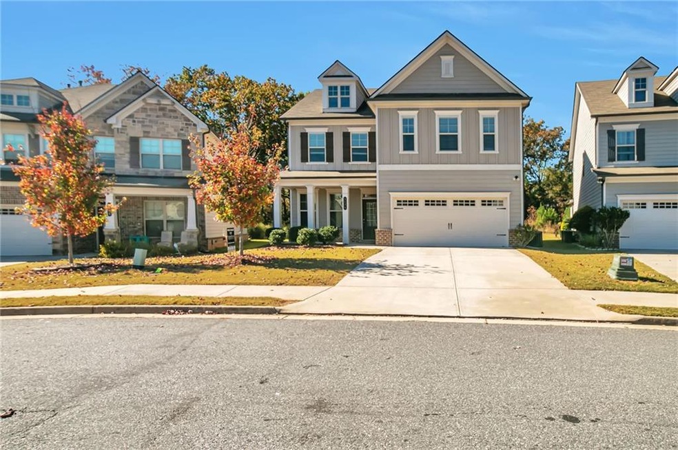 View of front of property with a garage
