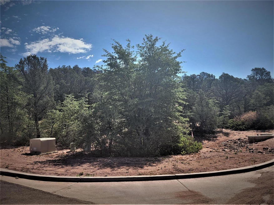 On left (north) side of corner