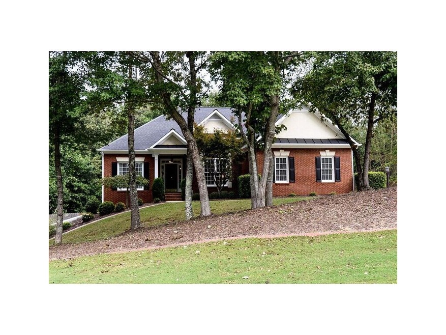 Brick and cement siding ranch with classic archite