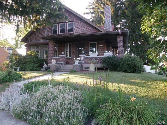 All brick with wrap around porch