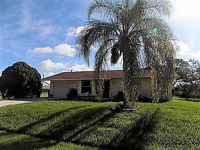 1607 SW Sylvester Ln, Port Saint Lucie, FL 34984 - photo 1