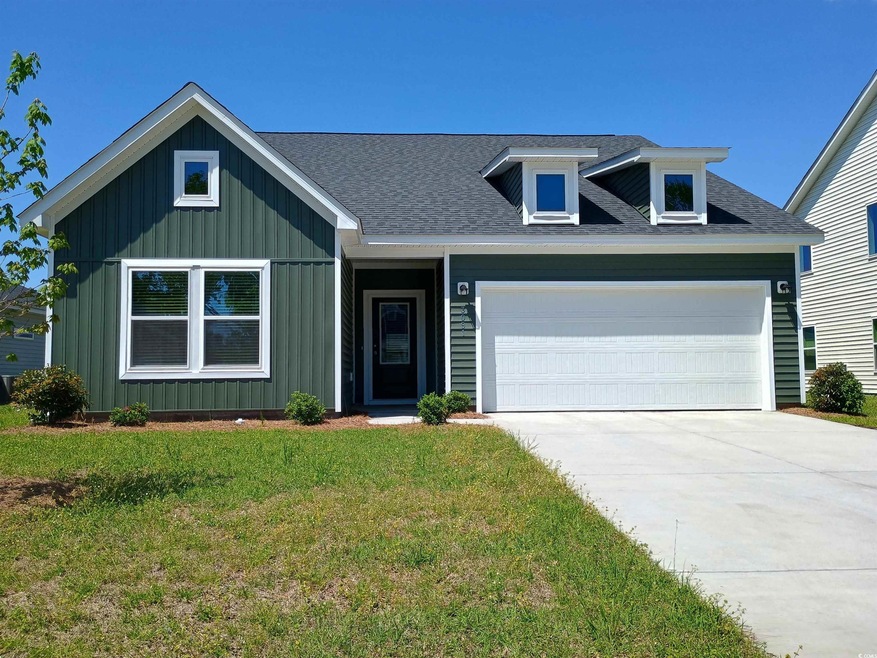 View of front of home with an attached garage, boa